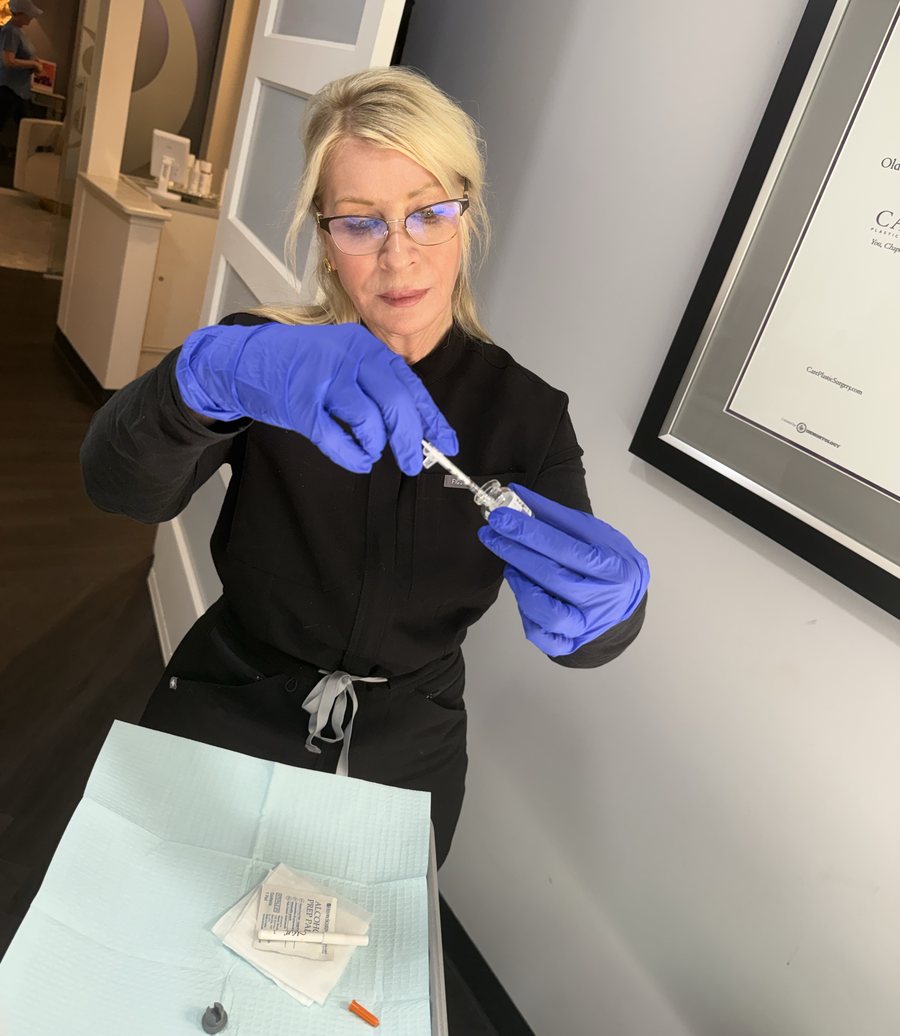 Lisa Adams preparing a BOTOX treatment at CARE Plastic Surgery